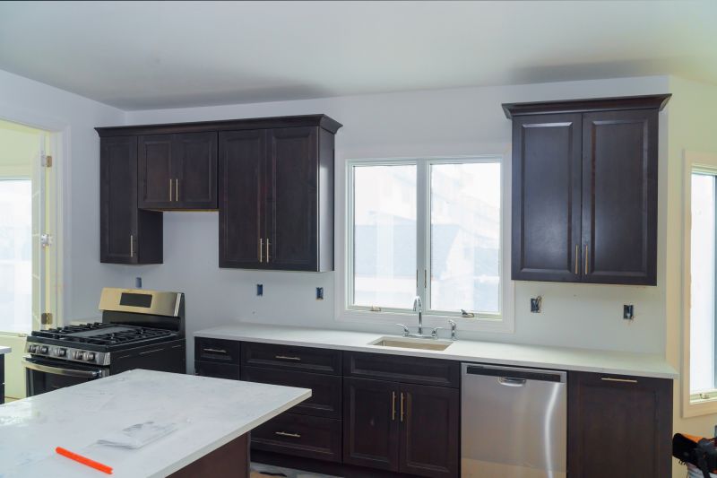 Refinished cabinets in a bright kitchen